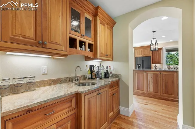 a bathroom with a sink and a window