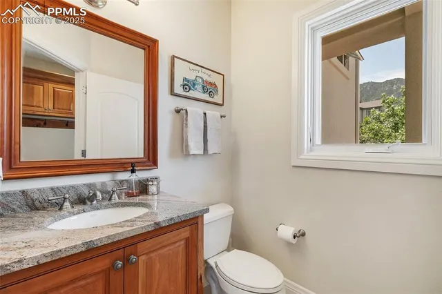 a spacious bedroom with a bed and large window