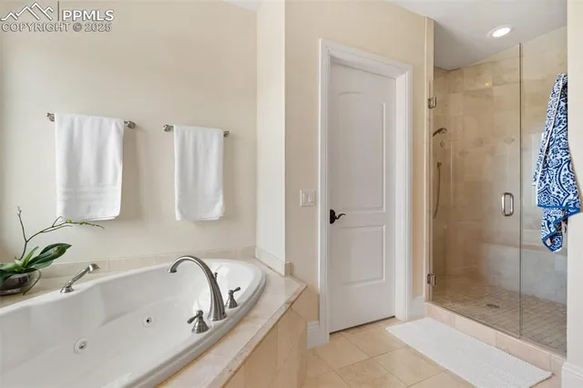 a view of a tables and chairs on the roof deck