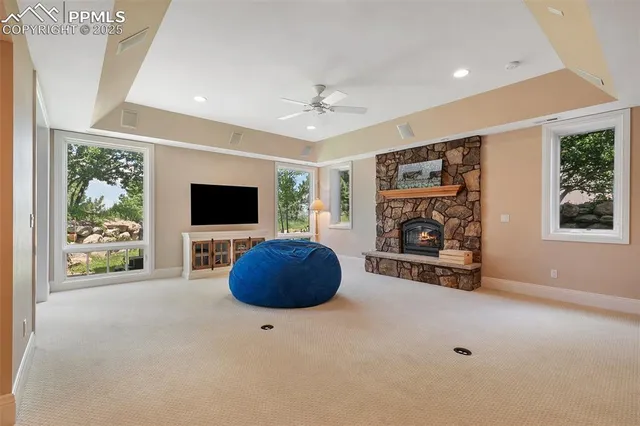 a view of a livingroom with furniture and windows