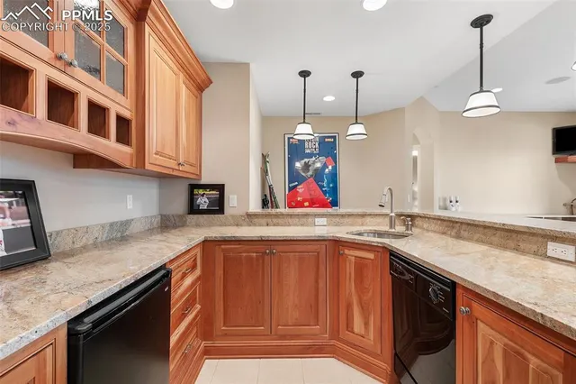 a bedroom with a bed and a table in it