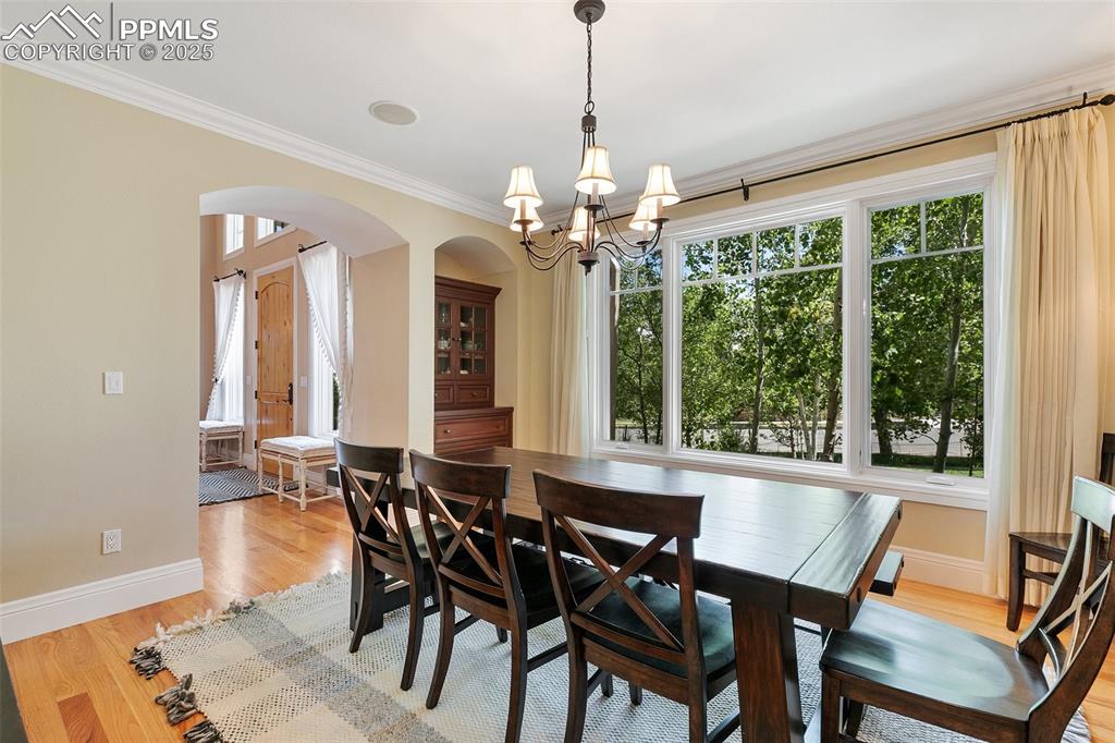4490 Star Ranch Road Colorado Springs, CO 80906 - Photo 6 of 50 a view of a dining room with furniture window and outside view