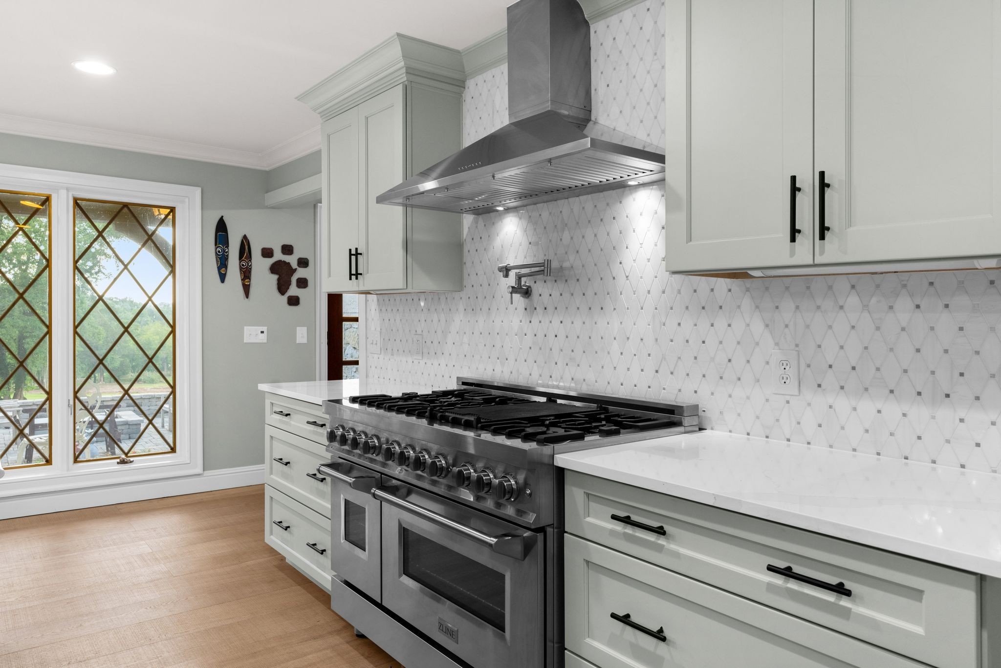 653 Flippen Road Lebanon, TN 37087 - Photo 15 of 71 a kitchen with stainless steel appliances granite countertop a stove and a microwave