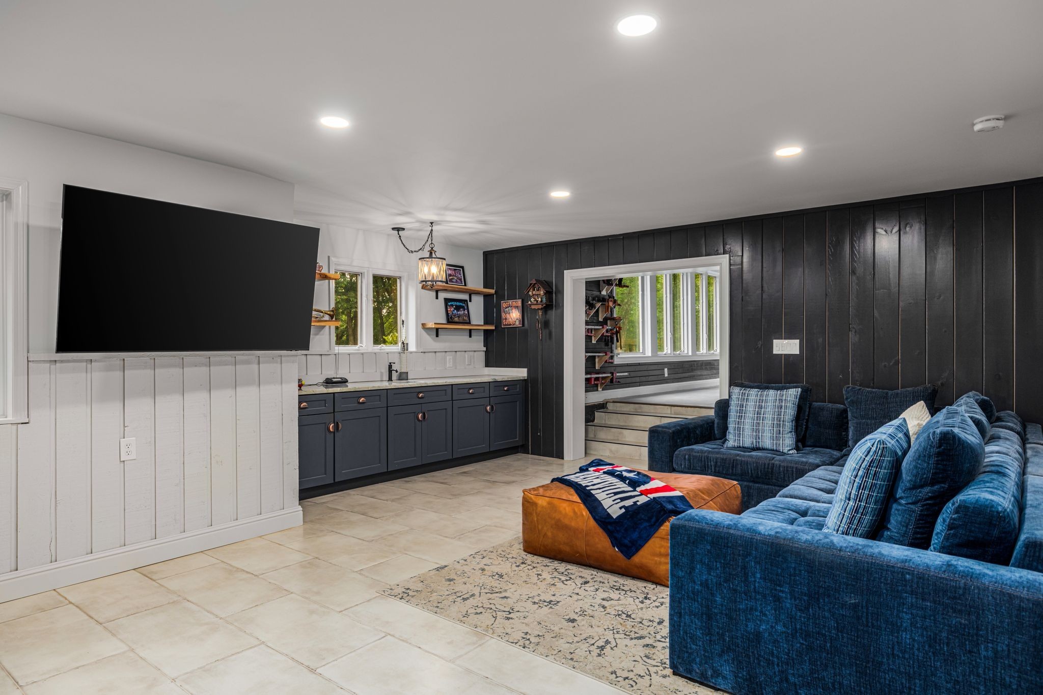 653 Flippen Road Lebanon, TN 37087 - Photo 25 of 71 a living room with furniture and a flat screen tv