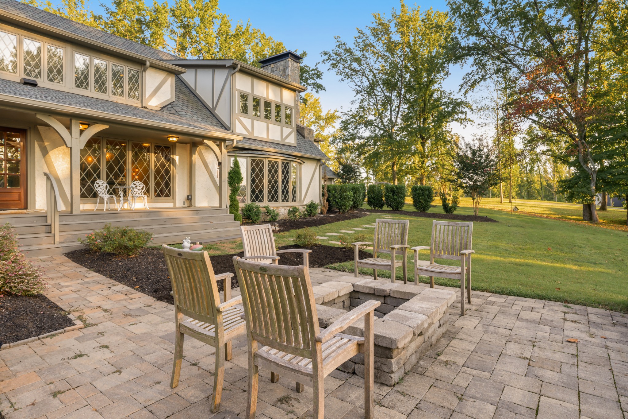 653 Flippen Road Lebanon, TN 37087 - Photo 43 of 71 a view of a chair and tables in the patio next to a yard