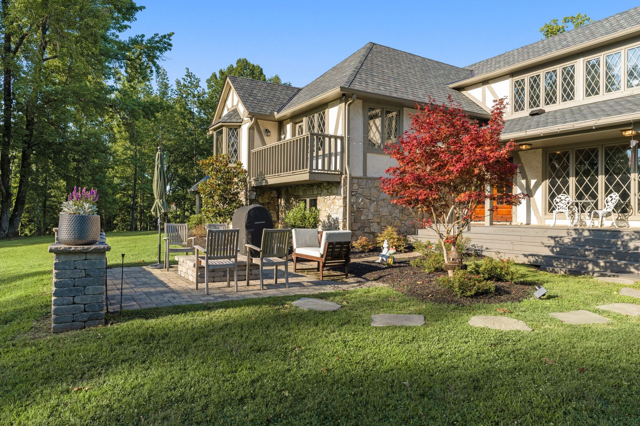 653 Flippen Road Lebanon, TN 37087 - Photo 44 of 71 a front view of a house with garden and sitting area