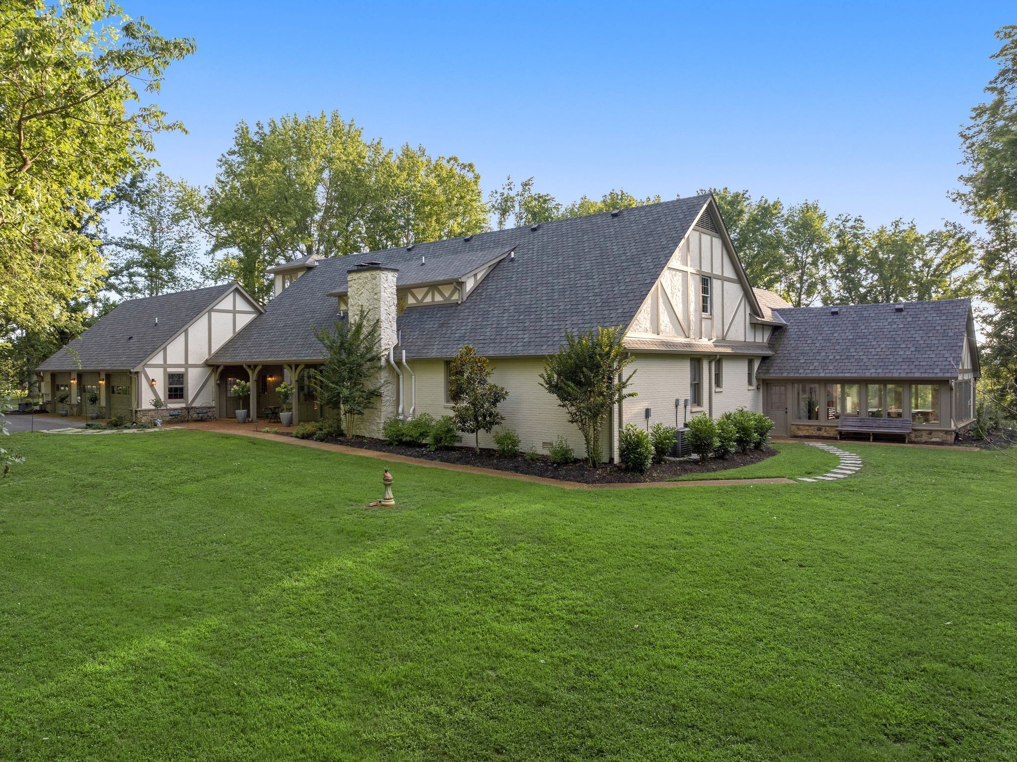 653 Flippen Road Lebanon, TN 37087 - Photo 46 of 71 a front view of a house with a garden