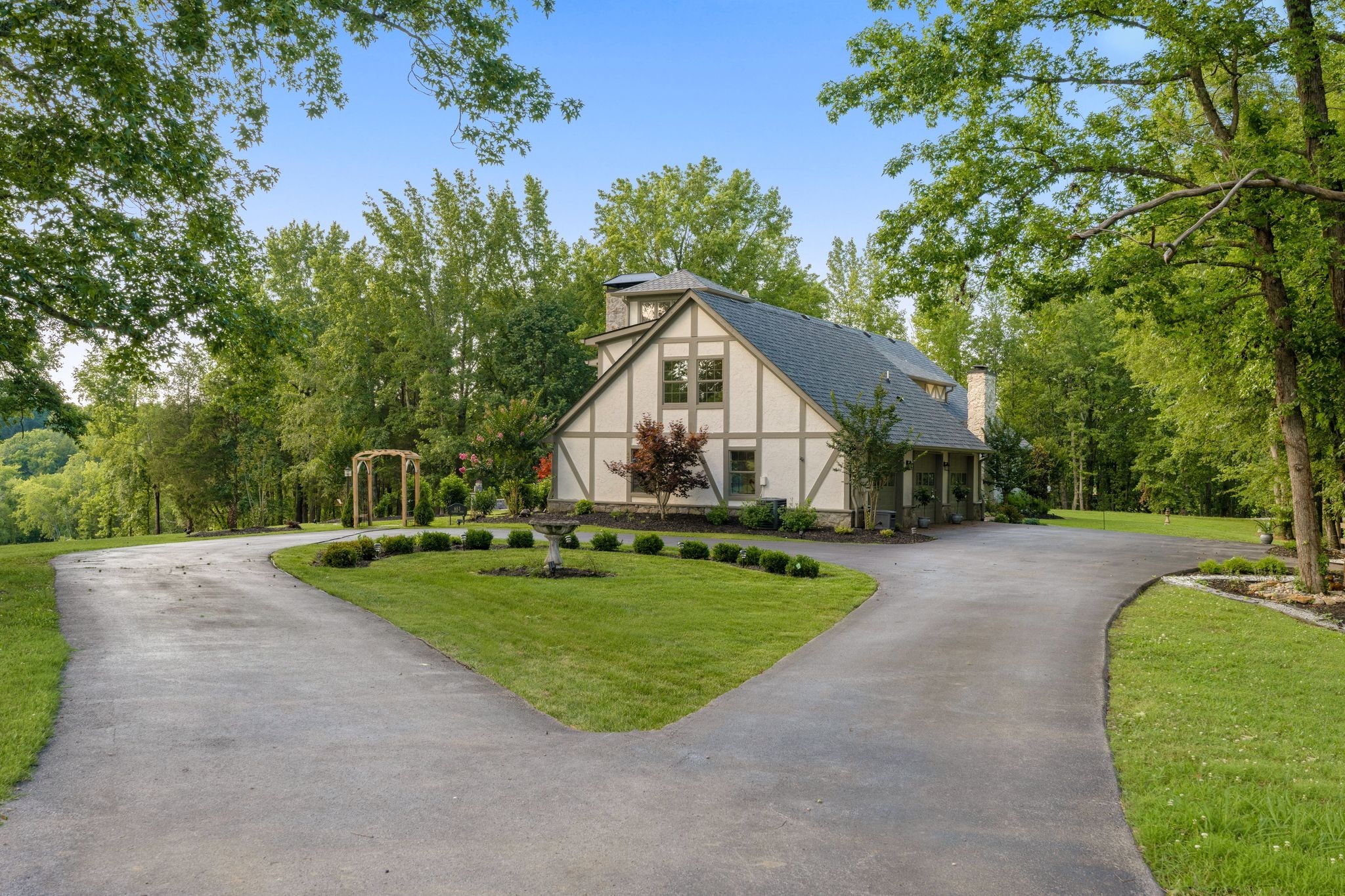 653 Flippen Road Lebanon, TN 37087 - Photo 50 of 71 a front view of a house with garden