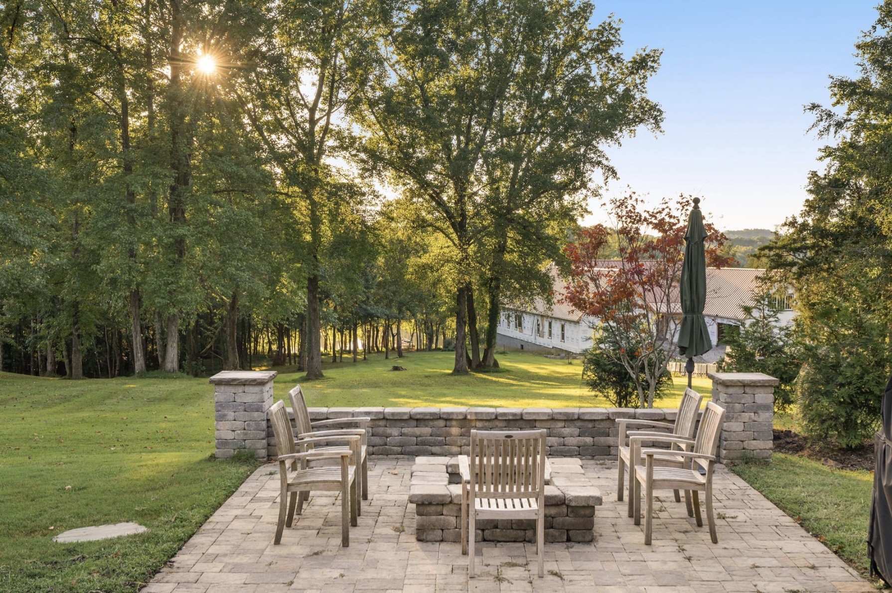 653 Flippen Road Lebanon, TN 37087 - Photo 53 of 71 a view of a wooden chairs and table in the garden