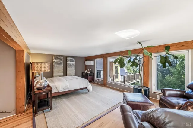 a bed room with a bed and a couch