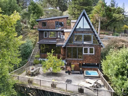 a front view of house with yard outdoor seating and yard