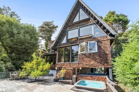 a house view with a outdoor space