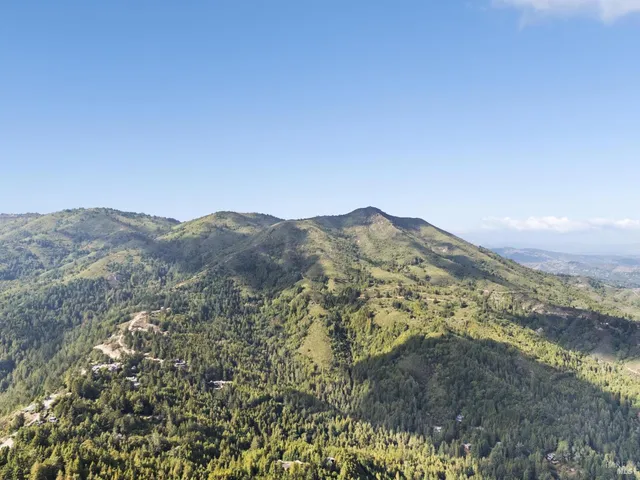 a view of mountains and valleys