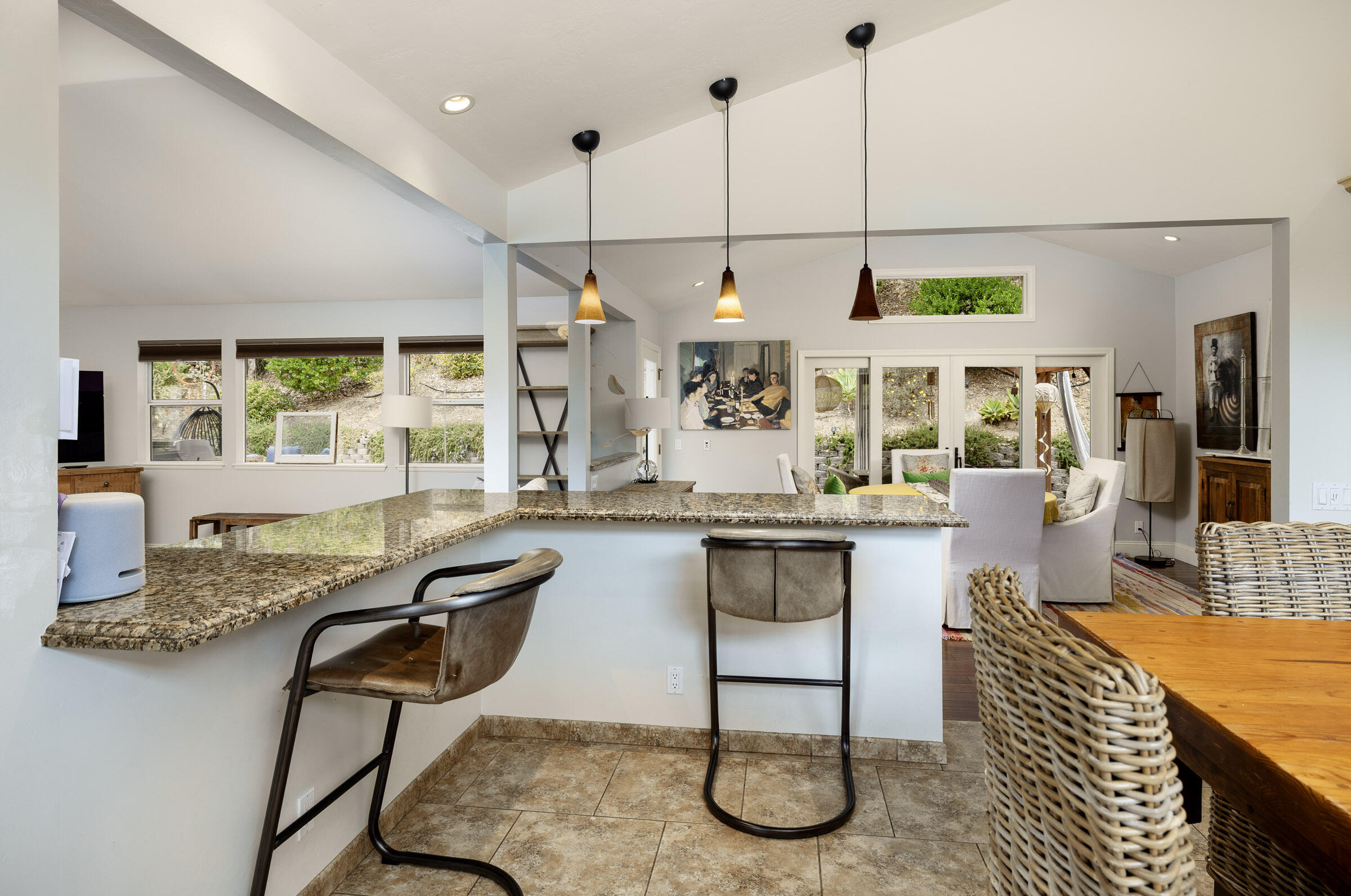 1352 Manitou Road Santa Barbara, CA 93101 - Photo 10 of 27 a kitchen with a large window cabinets and dining table