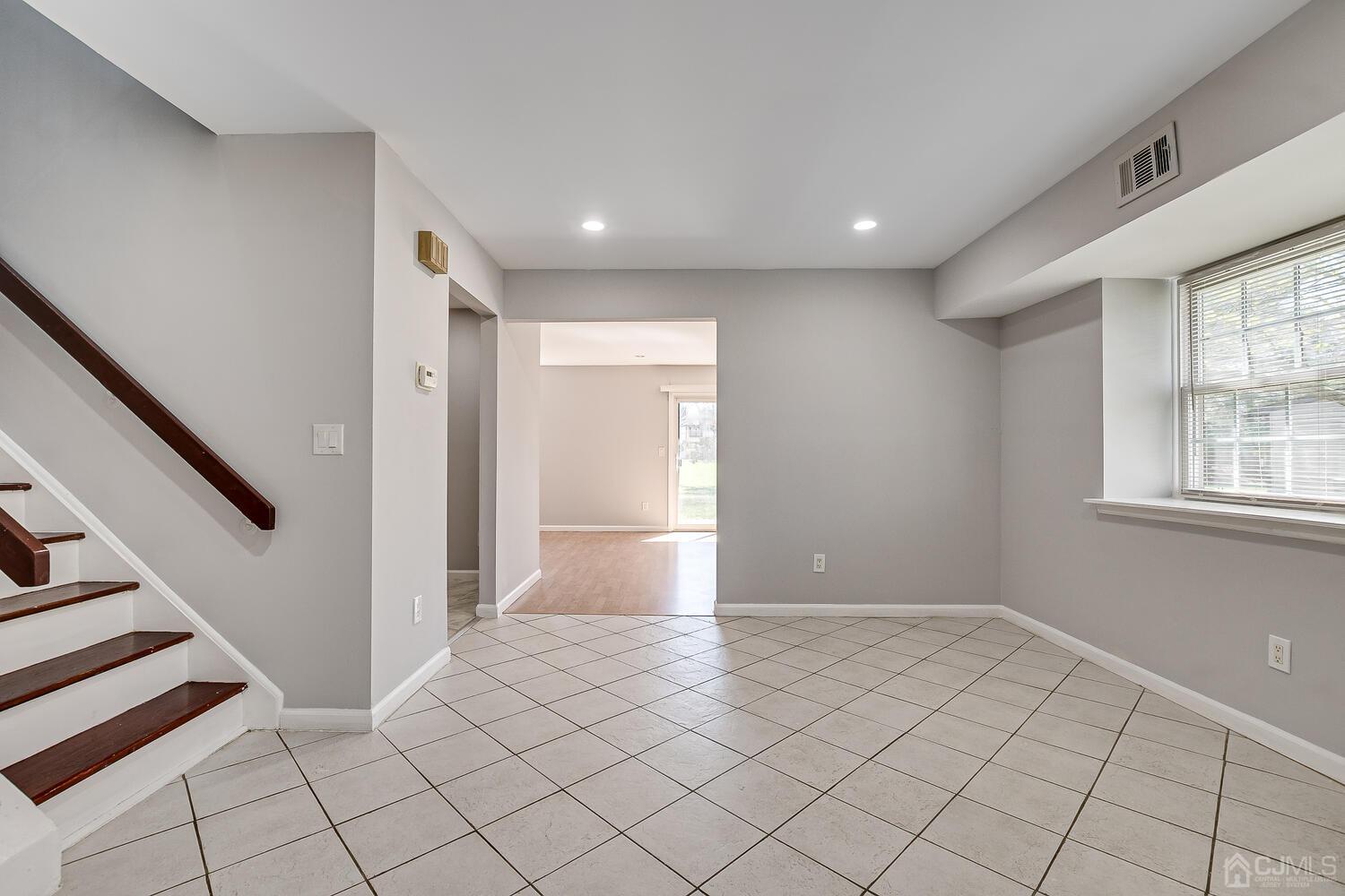 6308 Hana Road Edison, NJ 08817 - Photo 11 of 35 a view of an empty room and window