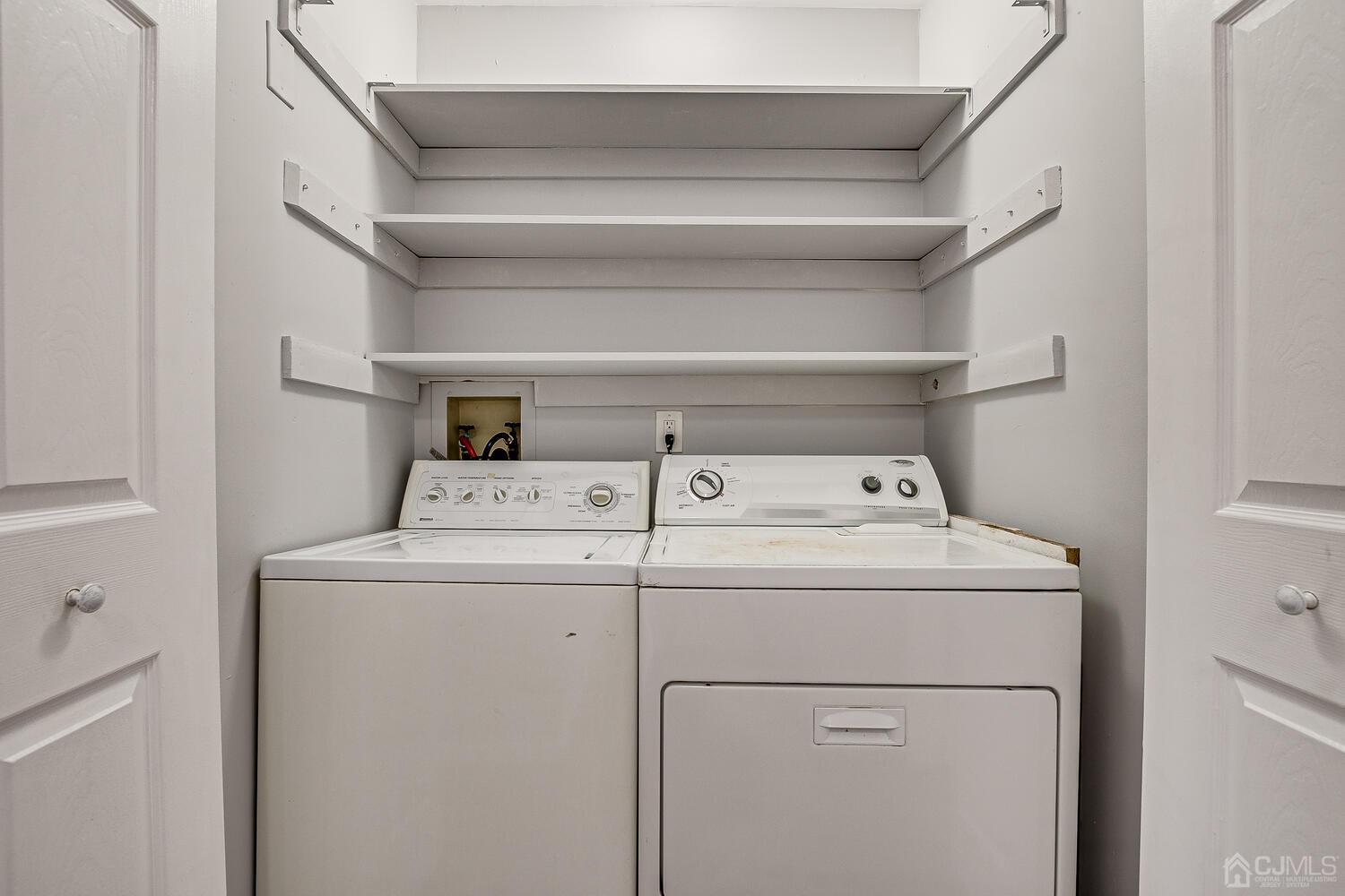 6308 Hana Road Edison, NJ 08817 - Photo 29 of 35 a utility room with dryer and washer