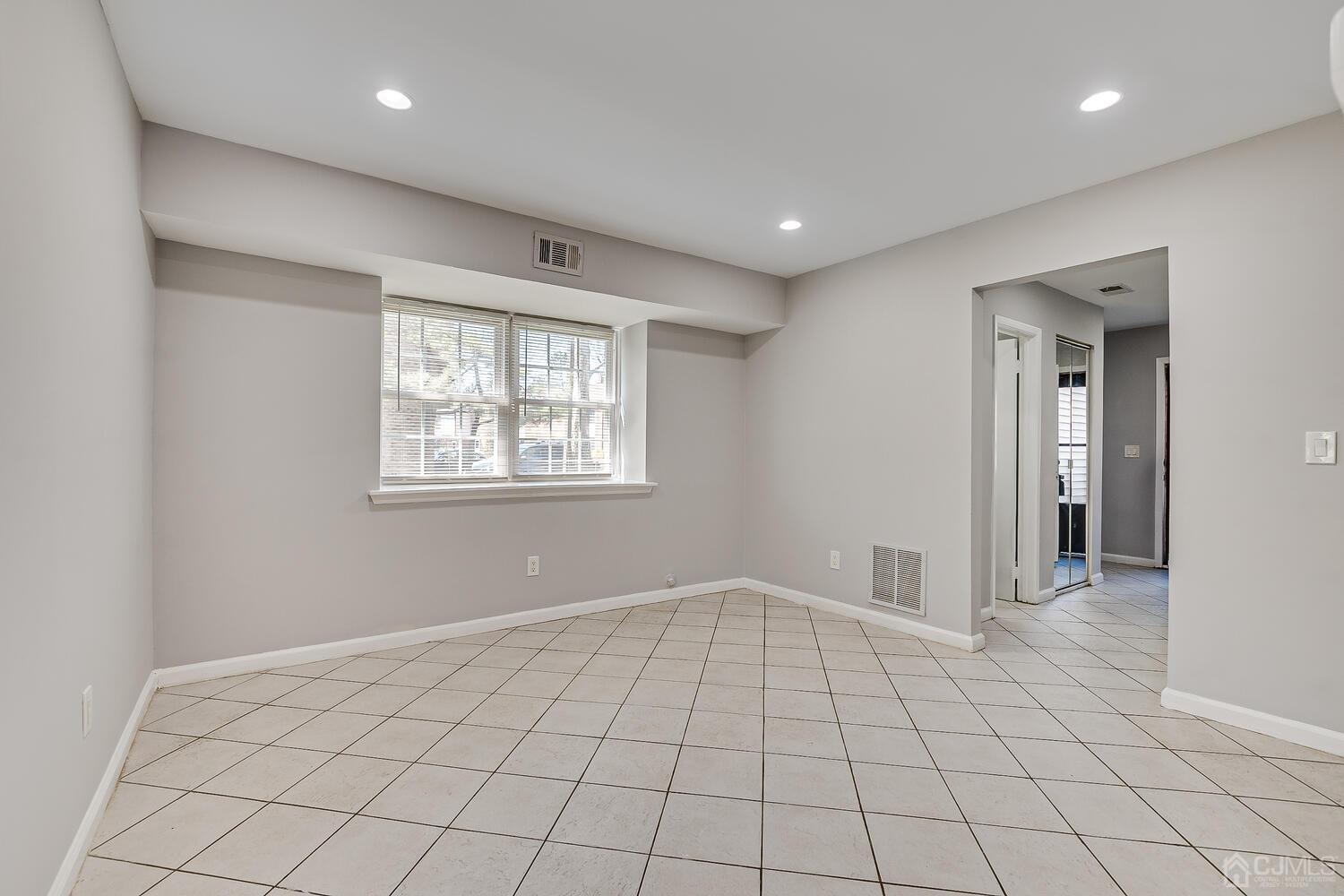 6308 Hana Road Edison, NJ 08817 - Photo 4 of 35 a view of an empty room and window