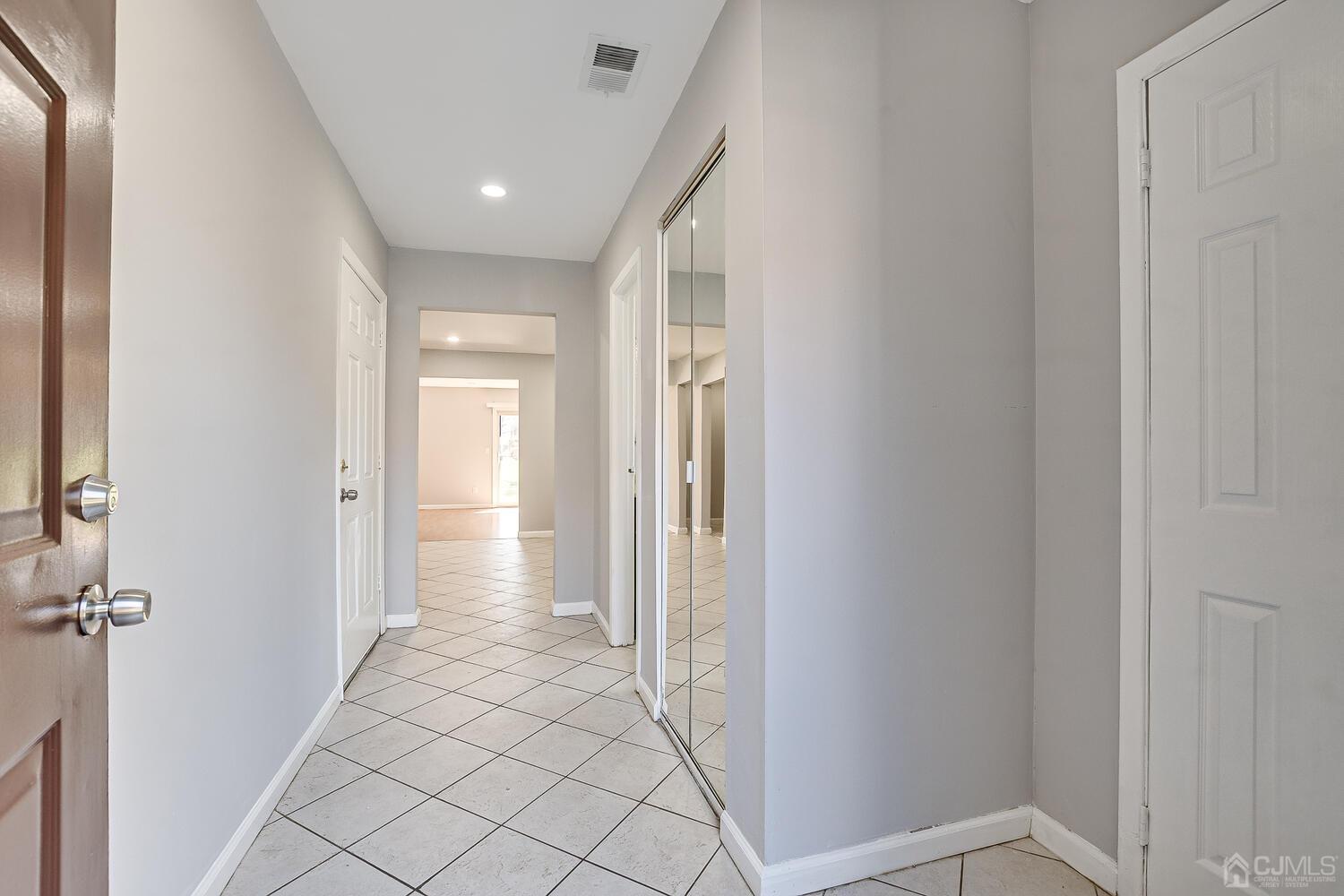 6308 Hana Road Edison, NJ 08817 - Photo 10 of 35 a view of a hallway
