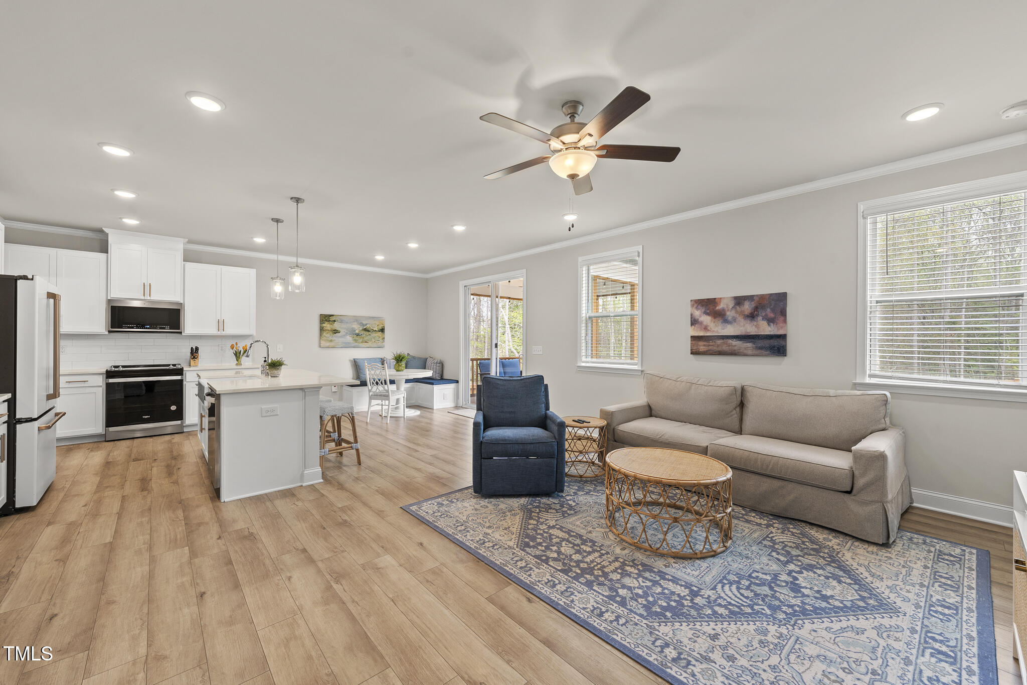 111 Kim Bark Path Garner, NC 27529 - Photo 11 of 52 a living room with furniture and kitchen view