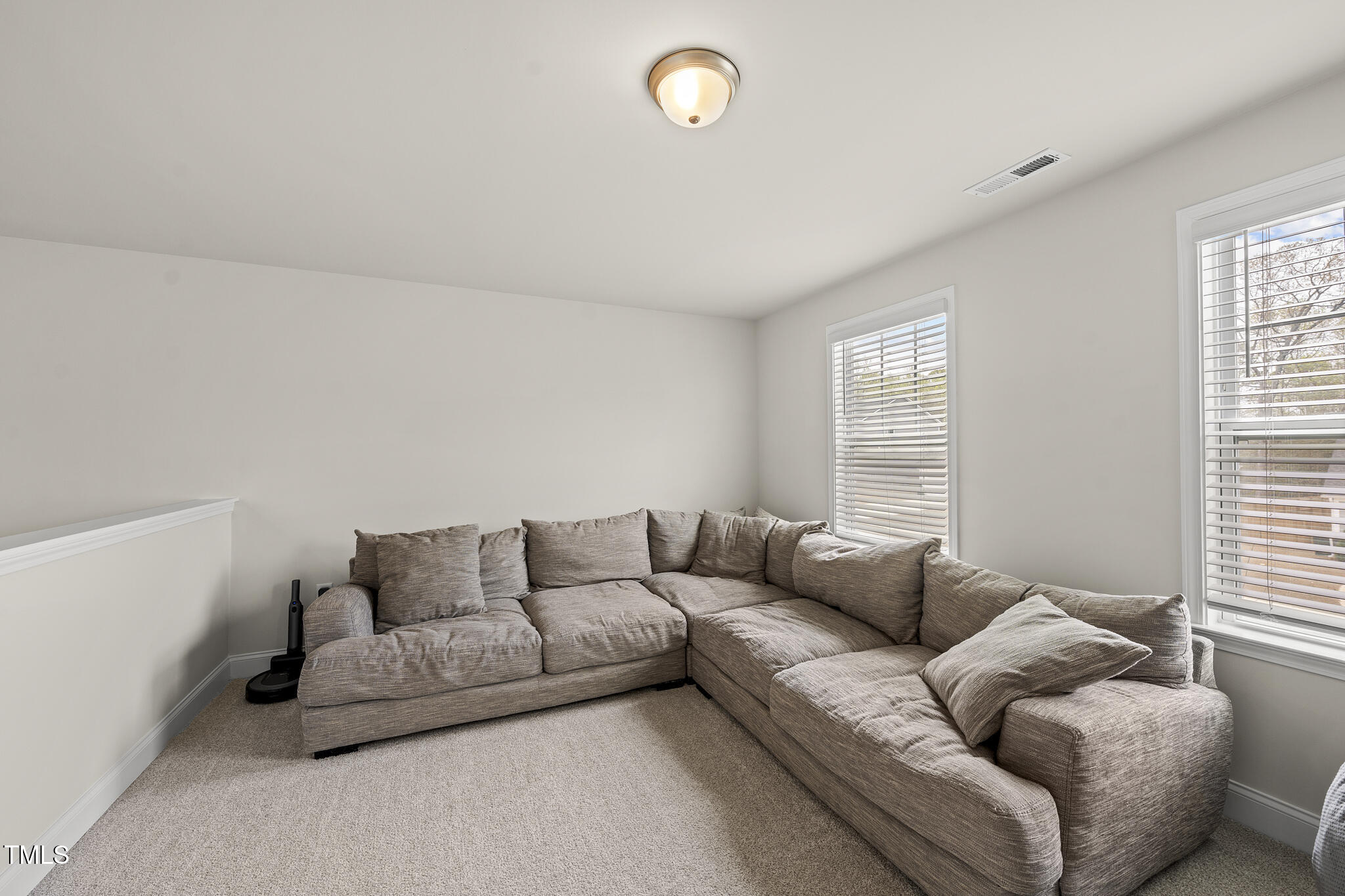111 Kim Bark Path Garner, NC 27529 - Photo 29 of 52 a living room with furniture and a window