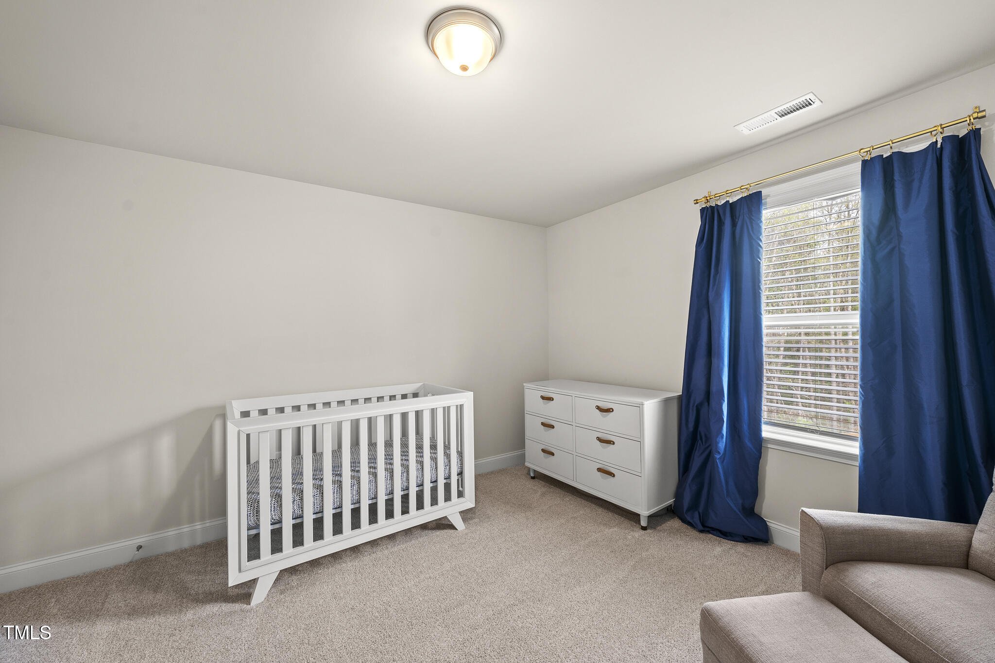 111 Kim Bark Path Garner, NC 27529 - Photo 37 of 52 a view of a bedroom with baby crib