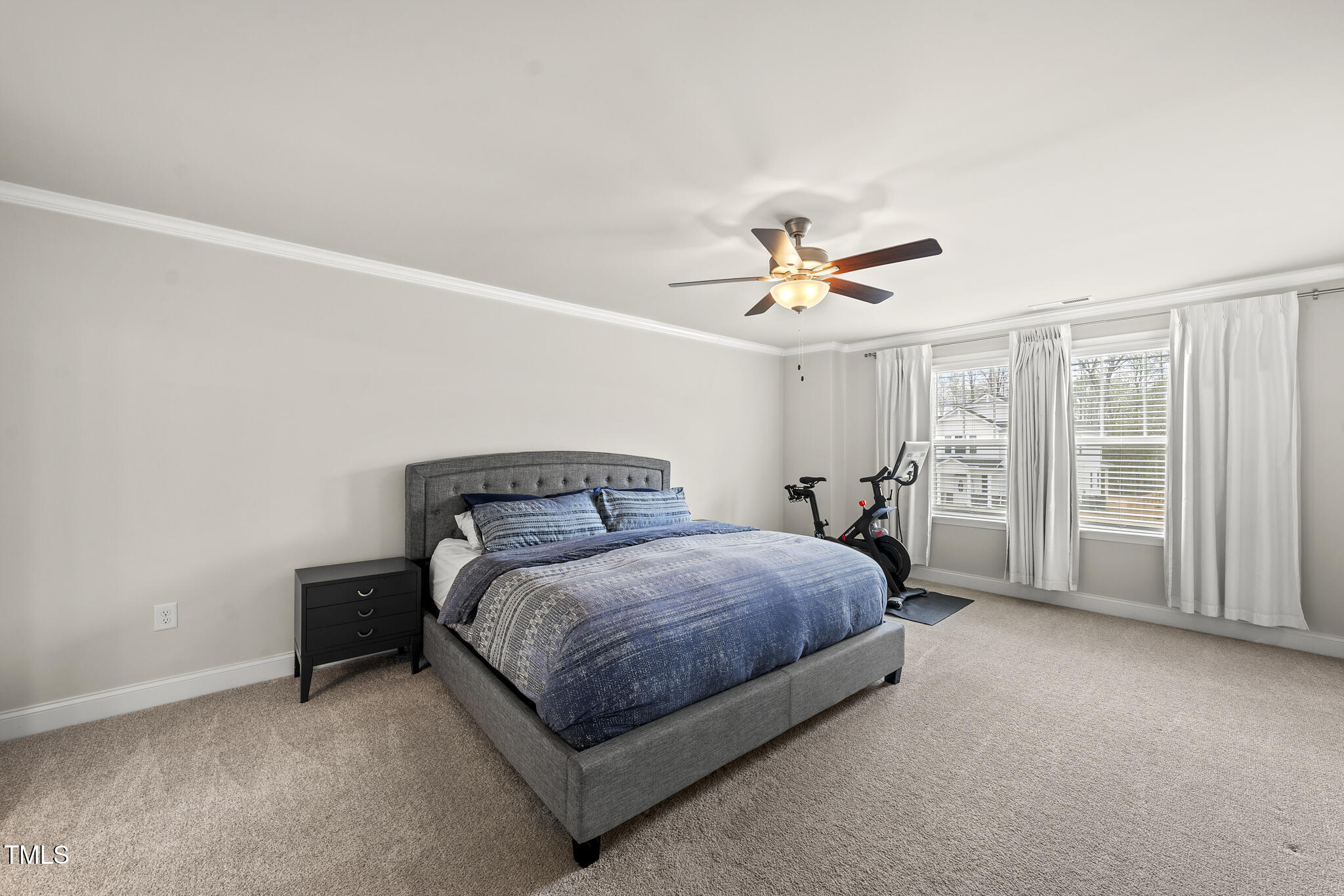 111 Kim Bark Path Garner, NC 27529 - Photo 39 of 52 a bedroom with a bed and window