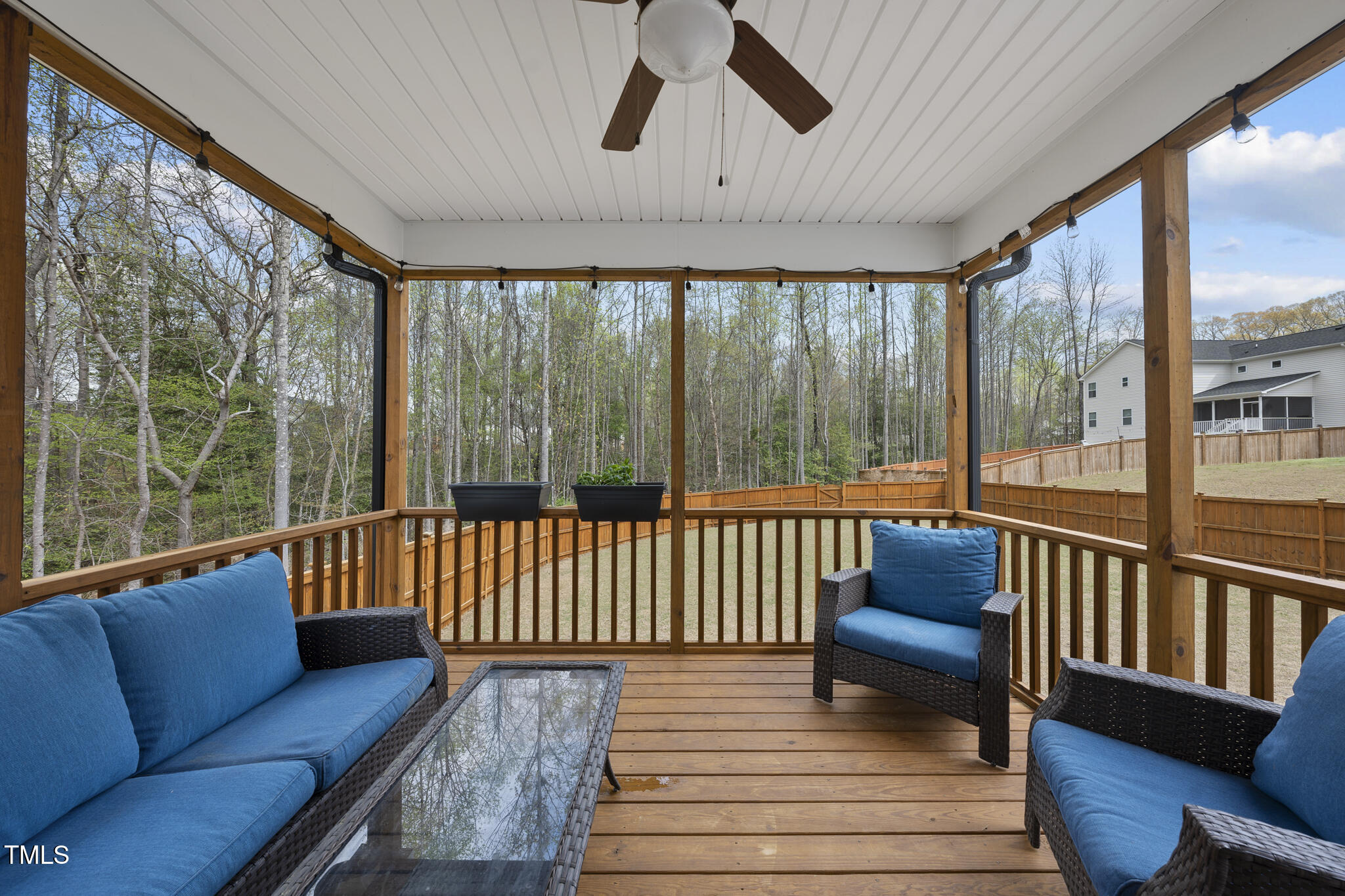 111 Kim Bark Path Garner, NC 27529 - Photo 51 of 52 a living room with wooden floor furniture and a large window
