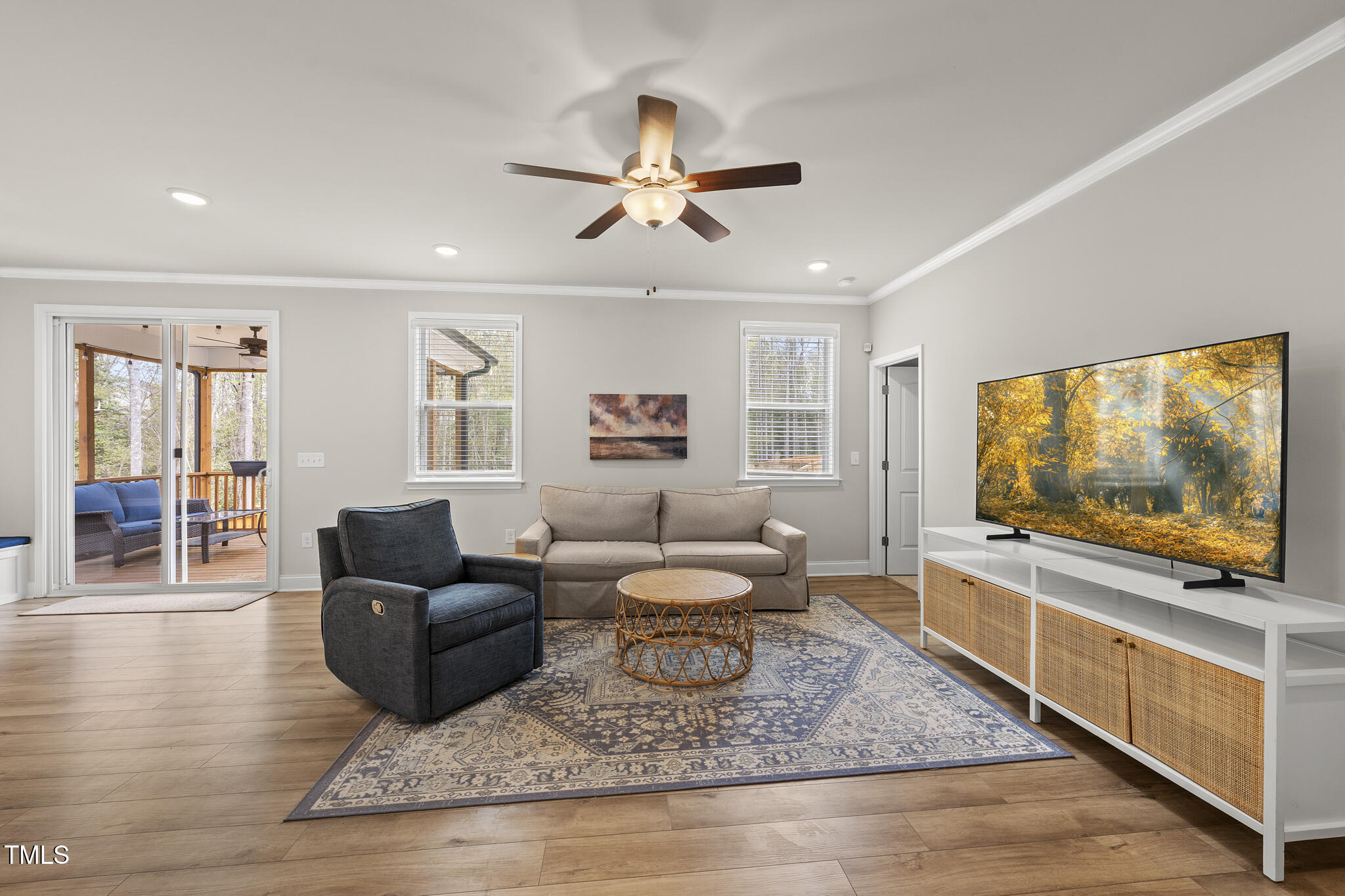 111 Kim Bark Path Garner, NC 27529 - Photo 10 of 52 a living room with furniture and a flat screen tv