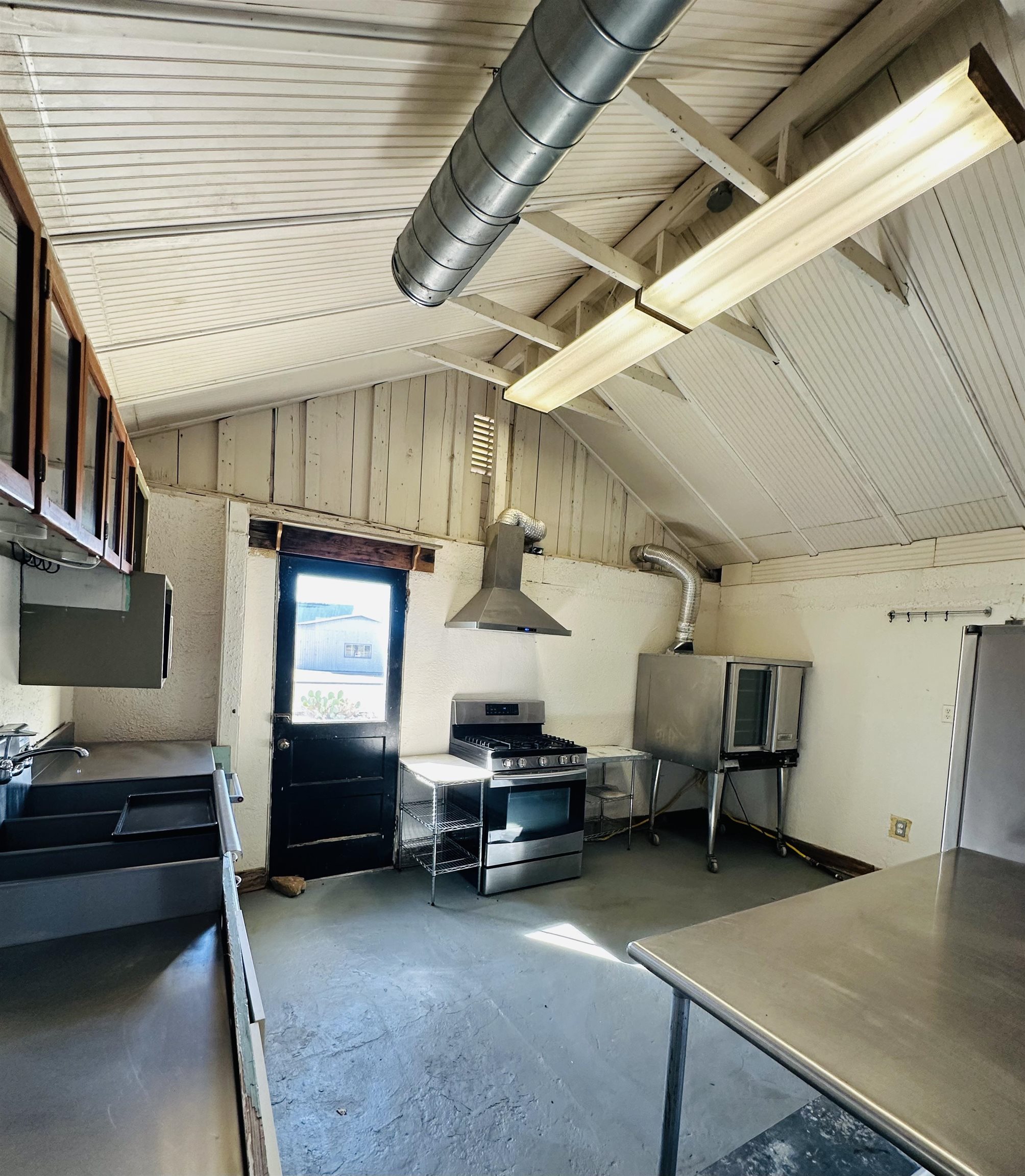 505 4th Street Lometa, TX 76853 - Photo 15 of 27 a view of a garage room with racks