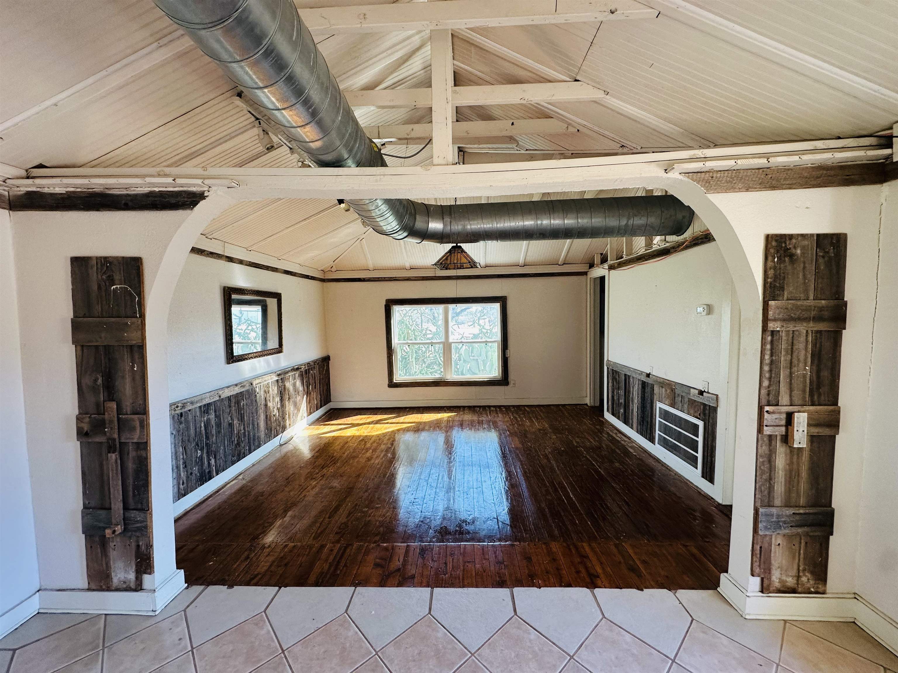 505 4th Street Lometa, TX 76853 - Photo 5 of 27 a view of outdoor space with wooden floor and fire pit