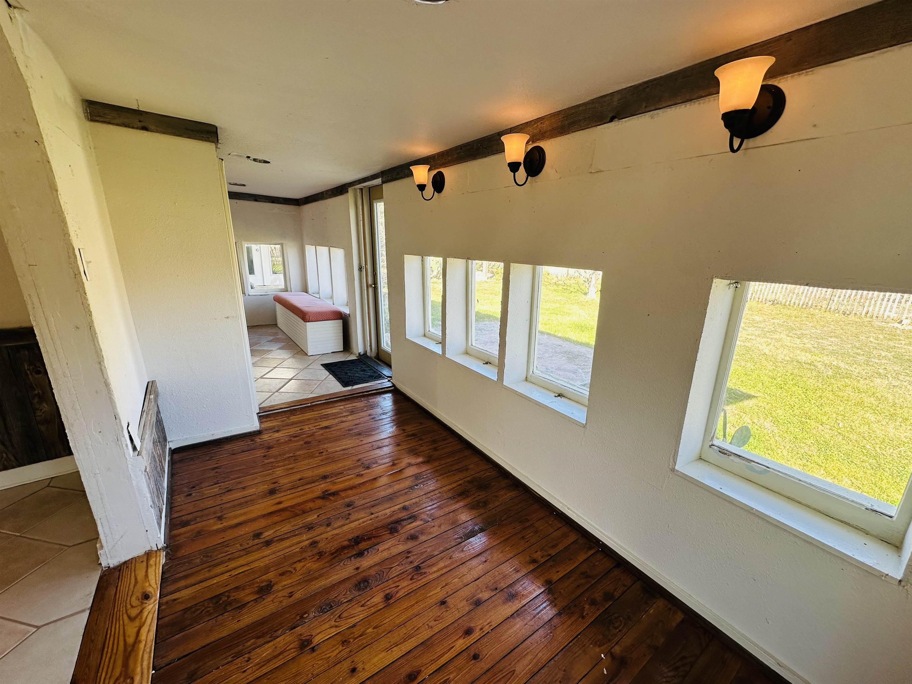 505 4th Street Lometa, TX 76853 - Photo 9 of 27 a view of an entryway with wooden floor