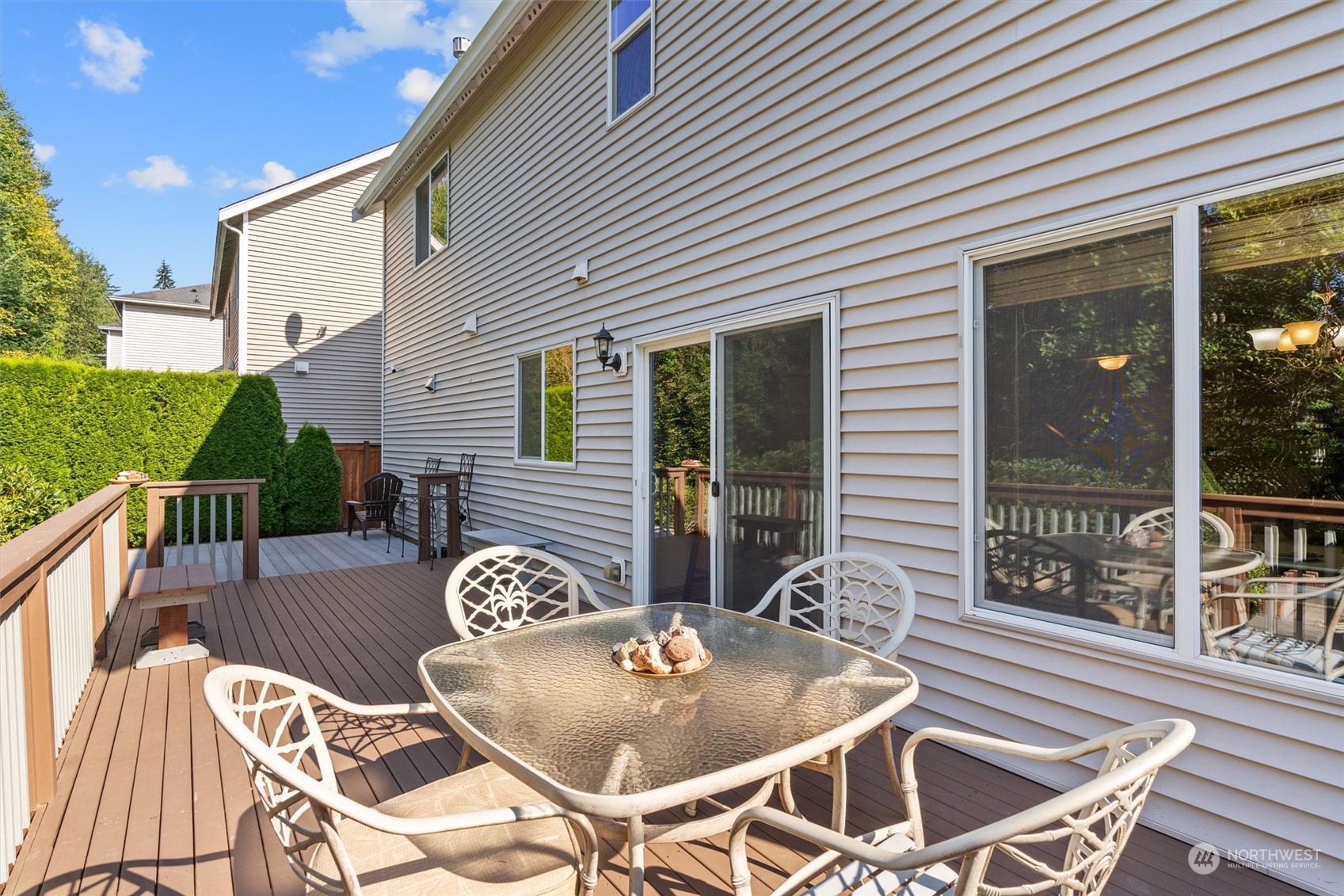 2505 194th Street Southeast Bothell, WA 98012 - Photo 15 of 31 a balcony with table and chairs