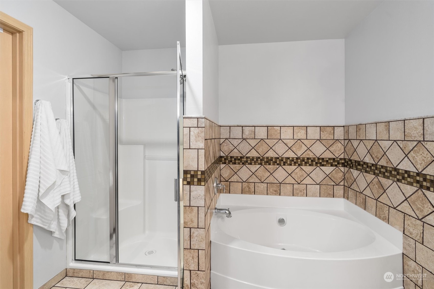 2505 194th Street Southeast Bothell, WA 98012 - Photo 20 of 31 a bathroom with a bathtub and a shower