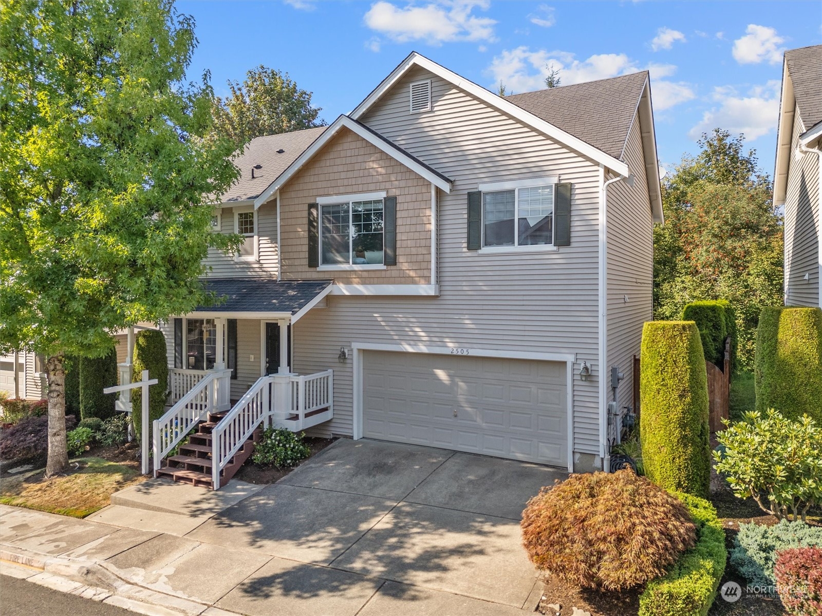 2505 194th Street Southeast Bothell, WA 98012 - Photo 2 of 31 a front view of a house with garden