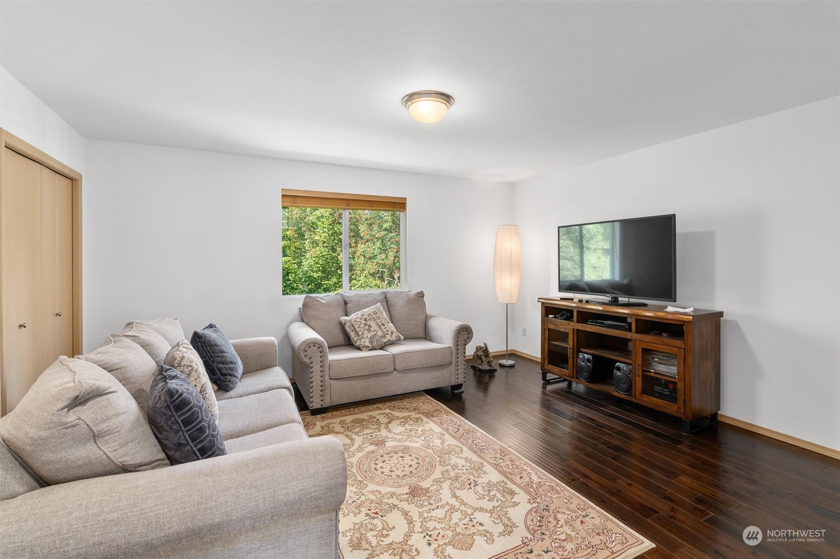 2505 194th Street Southeast Bothell, WA 98012 - Photo 21 of 31 a living room with furniture and a flat screen tv