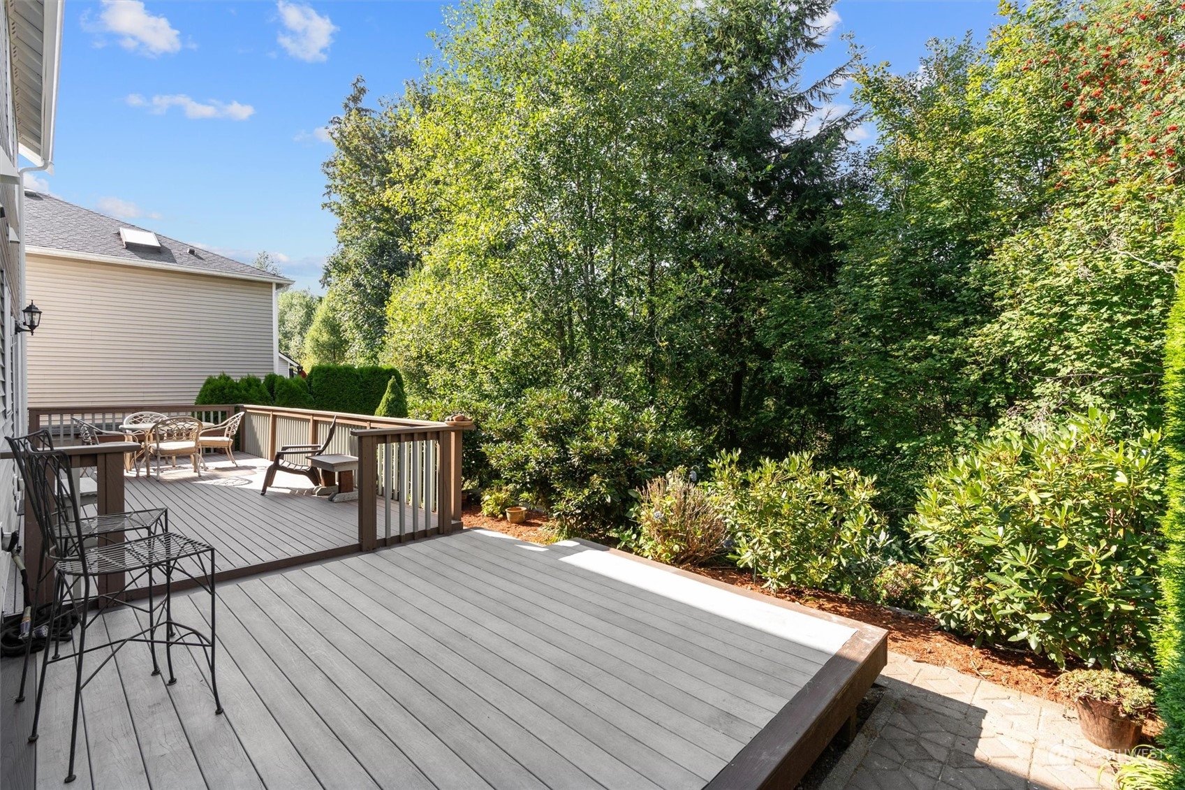 2505 194th Street Southeast Bothell, WA 98012 - Photo 29 of 31 a view of a roof deck with wooden floor and seating space
