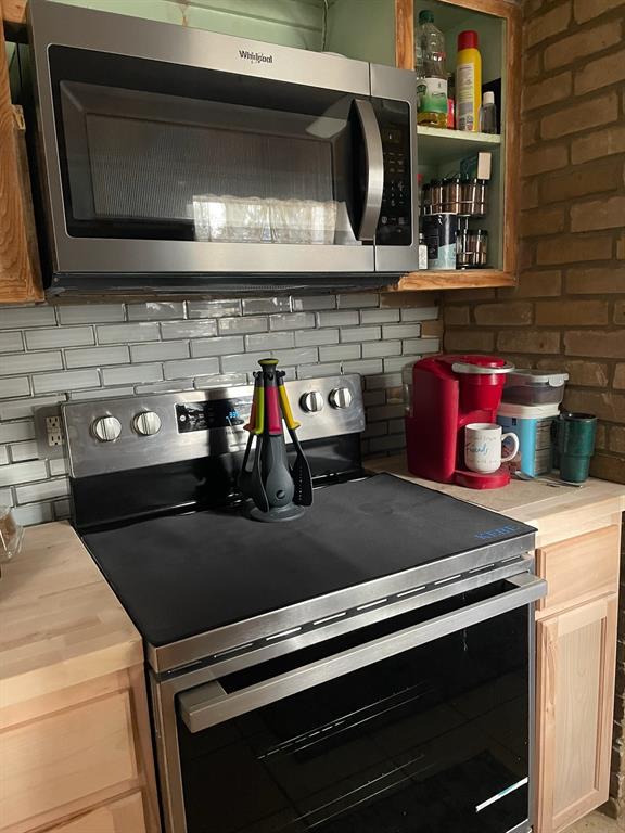 3640 Van Zandt County Road Ben Wheeler, TX 75754 - Photo 22 of 34 a close view of stove top oven