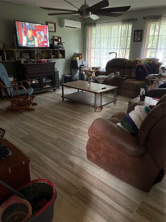 3640 Van Zandt County Road Ben Wheeler, TX 75754 - Photo 24 of 34 a living room with furniture and a flat screen tv