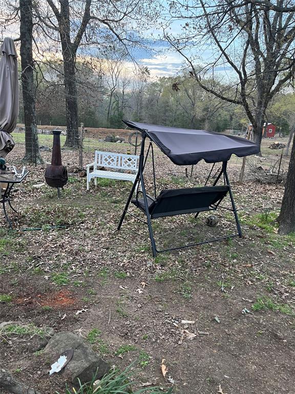 3640 Van Zandt County Road Ben Wheeler, TX 75754 - Photo 32 of 34 a view of outdoor space with seating