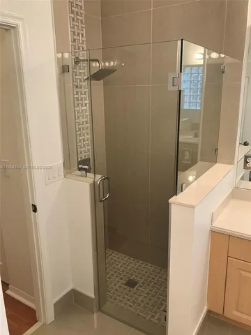 a bathroom with a bathtub and sink