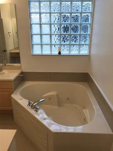 a view of a golf course with a lake