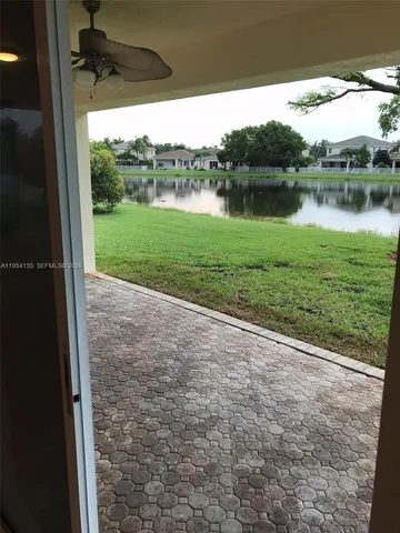 a view of a fireplace with wooden floor