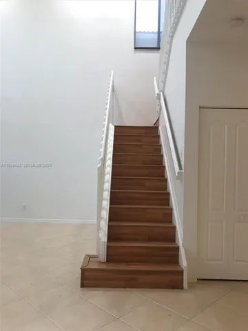 a bathroom with a tub and a sink