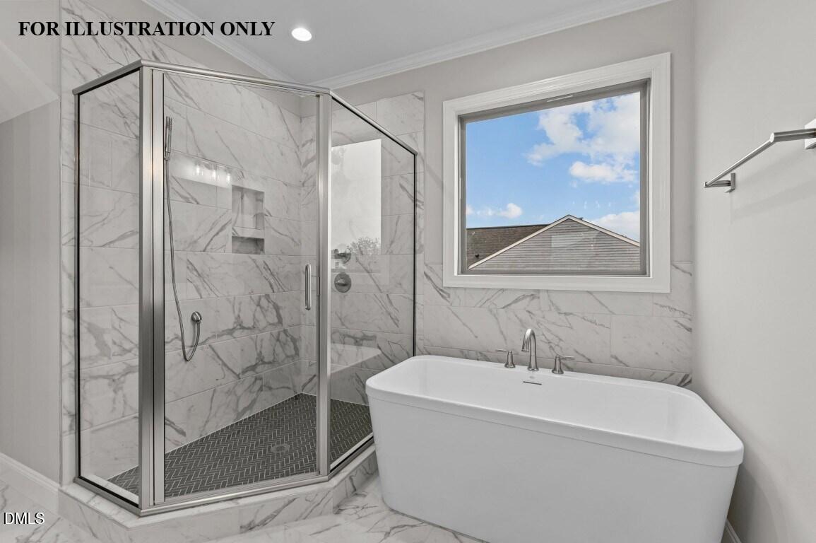 1032 Smoke Willow Way, Unit 148 Rolesville, NC 27571 - Photo 11 of 20 a bathroom with a bathtub and a shower