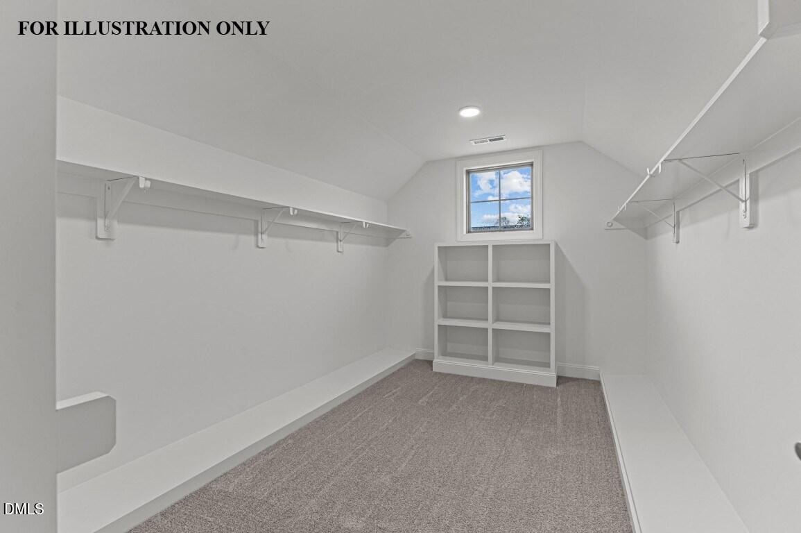 1032 Smoke Willow Way, Unit 148 Rolesville, NC 27571 - Photo 12 of 20 a view of an empty room with a window