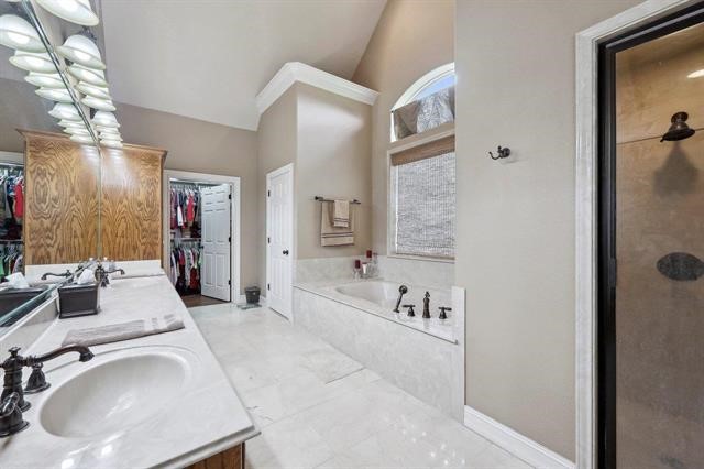 2014 Fish Lake Road Kountze, TX 77625 - Photo 11 of 35 a bathroom with a tub sink and mirror