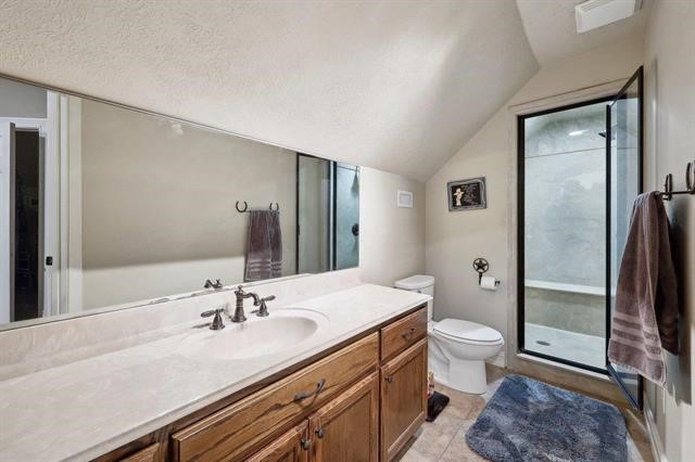 2014 Fish Lake Road Kountze, TX 77625 - Photo 17 of 35 a spacious bathroom with a granite countertop sink a toilet a mirror and shower