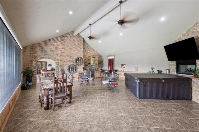 2014 Fish Lake Road Kountze, TX 77625 - Photo 24 of 35 a living room with lots of furniture and gym equipment