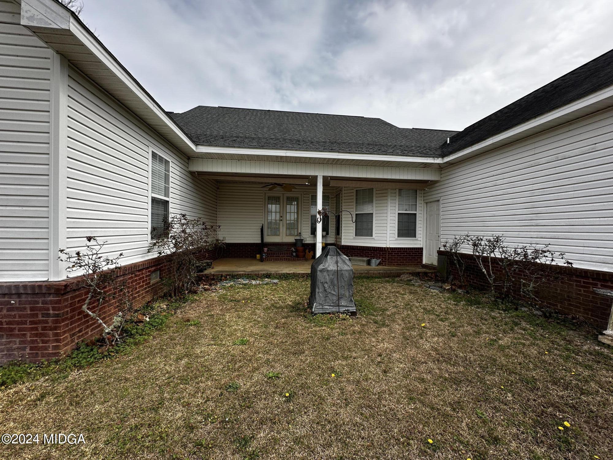 2557 Elko Road Elko, GA 31025 - Photo 5 of 62 a house view with a backyard space