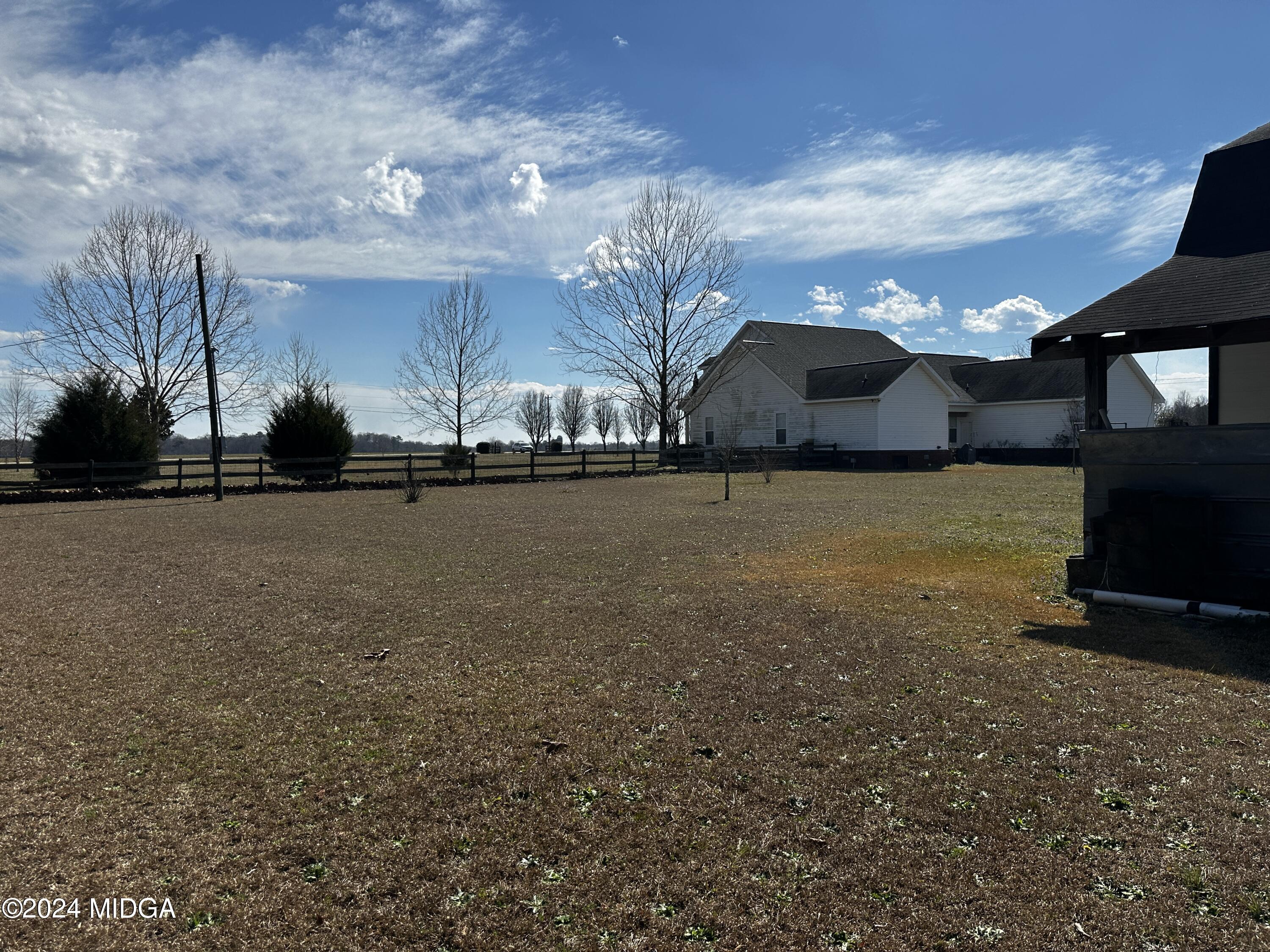 2557 Elko Road Elko, GA 31025 - Photo 54 of 62 a view of a house with a yard